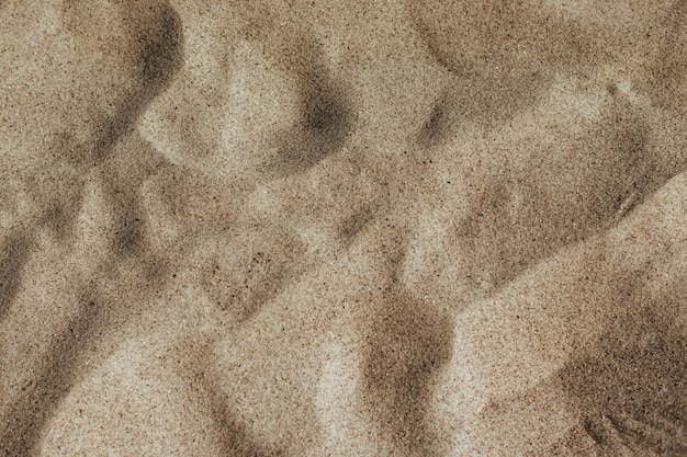 Texture de vacances d'été de la plage de sable, concept de vacances de voyage