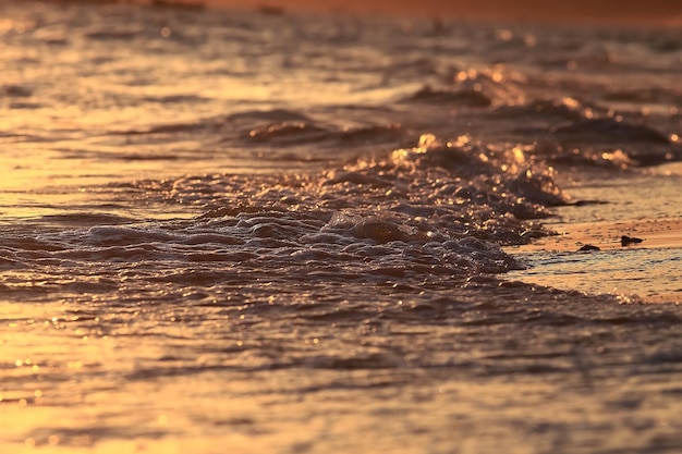 Texture des vagues au coucher du soleil