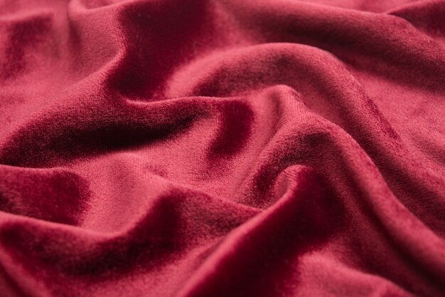 Texture de velours rouge avec des vagues.