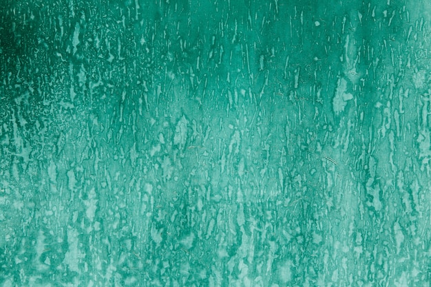 Texture verte sur le mur avec la rouille