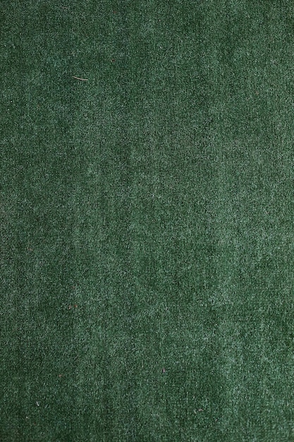 Texture verticale d'herbe verte artificielle