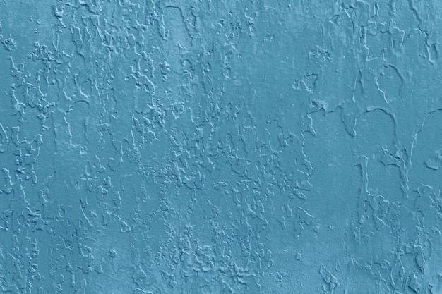 Texture de la vieille peinture bleue sur le mur.