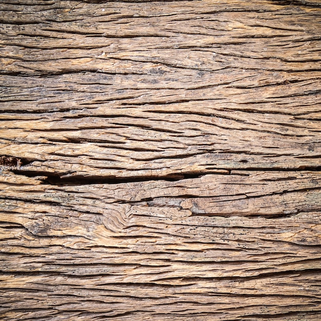 La texture de la vieille planche de bois peut être utilisée comme arrière-plan