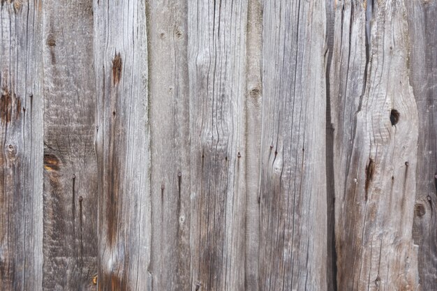 Texture de vieux bois lisse gris beige. Clôture de planche