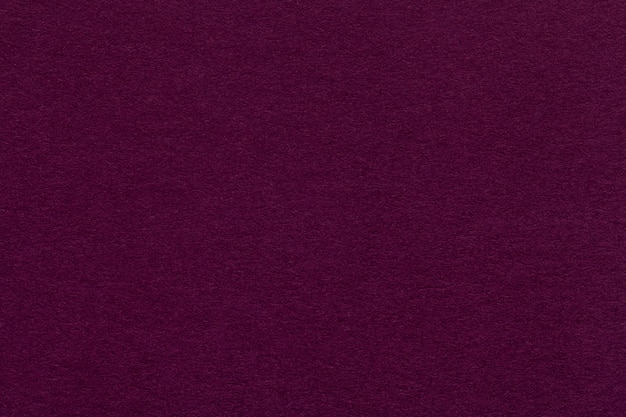 Texture de vieux closeup papier violet foncé. Le fond magenta