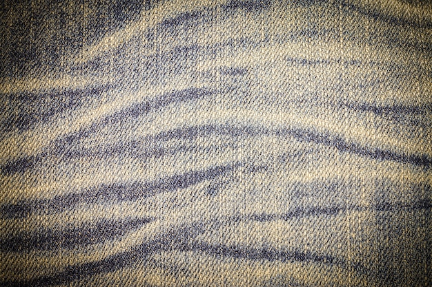 Texture vintage de jeans bleus.