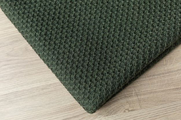 Le tissu angora est vert. le tissu est vert. tissu en laine texturé