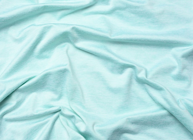 Tissu en coton bleu froissé pour coudre des t-shirts et des vêtements, gros plan