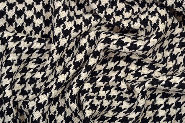 Tissu drapé de laine de pied d'oie en tweed comme texture d'arrière-plan