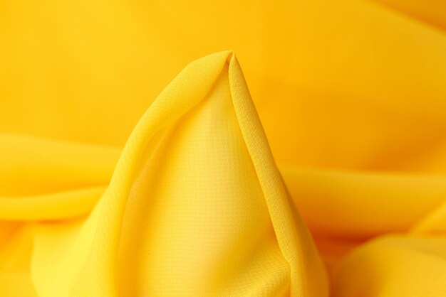Tissu jaune en forme de fond
