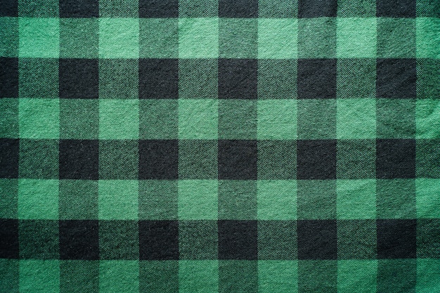 Tissu noir et vert dans une cage