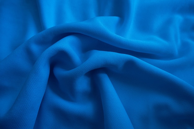 Tissu ondulé bleu abstrait Fond de tissu bleu