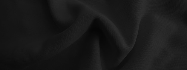 tissu ondulé noir abstrait fond de tissu foncé