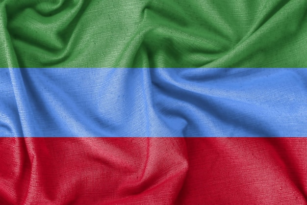 Photo tissu de soie réaliste de fond de drapeau de pays du daghestan