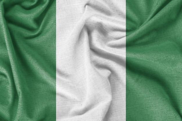 Photo tissu de soie réaliste de fond de drapeau de pays du nigeria