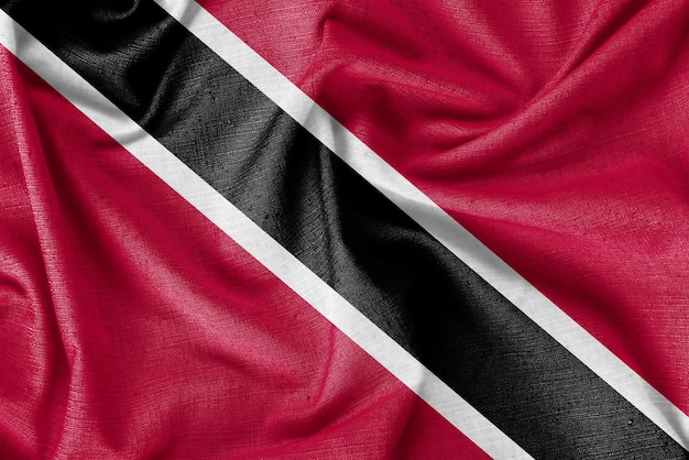 Photo tissu de soie réaliste de fond de drapeau de pays de trinité-et-tobago