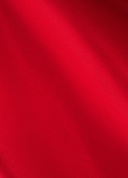 Tissu de soie rouge drapé de fond de texture satin