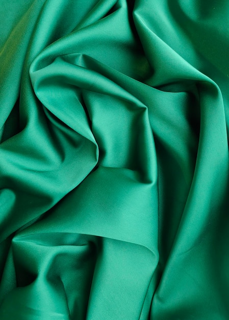 Tissu de soie vert avec un fond vert