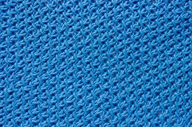 Photo tissu de texture lié avec du fil bleu.