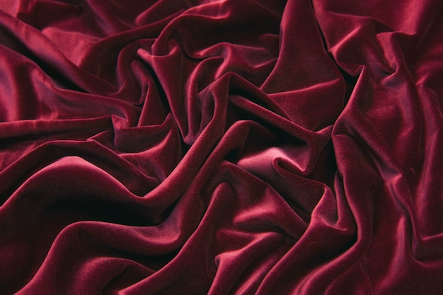 Tissu velours luxueux en rouge.