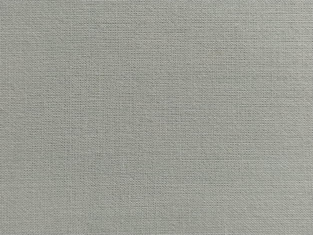 Tissu vert clair pâle Un morceau de tissu de laine disposé soigneusement sur la surface Entrelacs et texture textile Tissu vestimentaire ou pour les besoins de la cuisine nappe ou rideaux