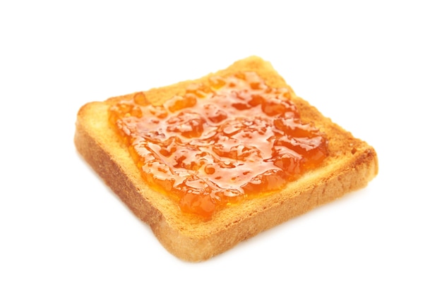 Toast avec confiture isolé sur fond blanc. Vue de dessus