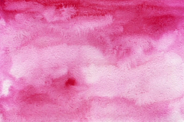 Toile de fond peinte à la main sur fond aquarelle rose abstrait sur papier texturé