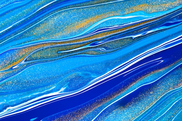 Toile de fond de texture d'art fluide avec des illustrations en acrylique liquide à effet de peinture tourbillonnante abstraite qui coule et éclabousse des peintures mélangées pour l'affiche intérieure aux couleurs débordantes d'or bleu marine et d'azur