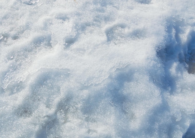 Photo la toile de fond de la texture de la neige déchiquetée