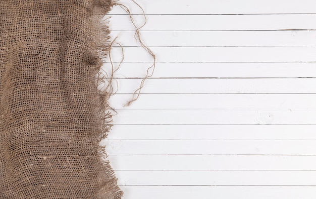 Toile de jute sur bois blanc