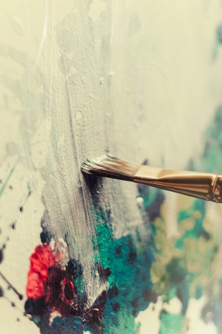 Photo toile avec peinture et pinceaux