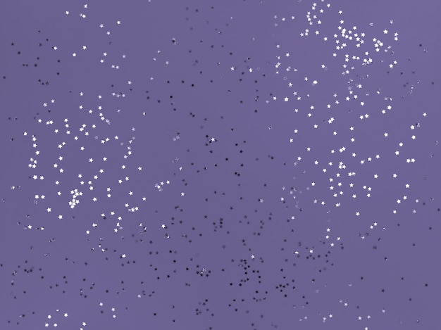 Étoiles de confettis étincelantes sur fond de couleur lavande.