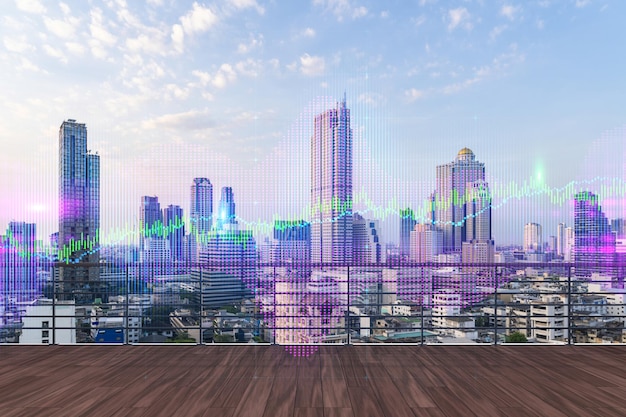 Toit avec terrasse en bois Skyline du coucher du soleil de Bangkok Prévision et modélisation commerciale des graphiques numériques hologrammes des marchés financiers Centre-ville Double exposition