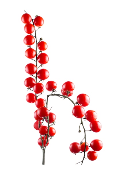 Tomates cerises rouges mûres sur fond blanc