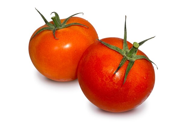 Tomates fraîches isolés sur fond blanc