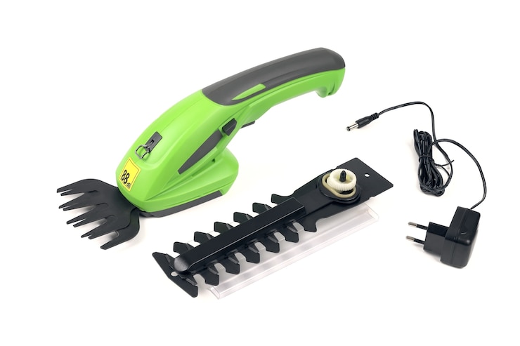 Photo tondeuse à main rechargeable électrique pour la taille des buissons de jardin et la décoration de figurines