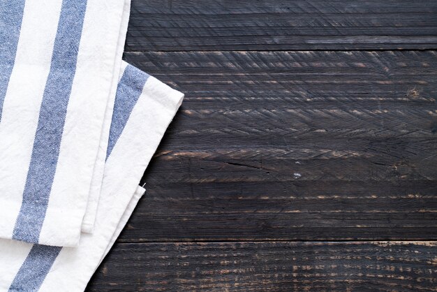 Photo torchon de cuisine (serviette de table) sur fond de bois