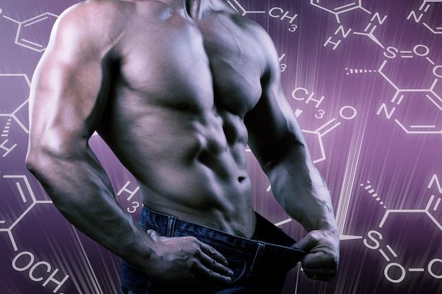 Photo torse musclé et formule de testostérone. concept de méthodes d'augmentation d'hormones.