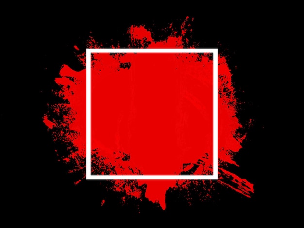La touche rouge dans le carré blanc est isolée sur fond noir. photo de haute qualité