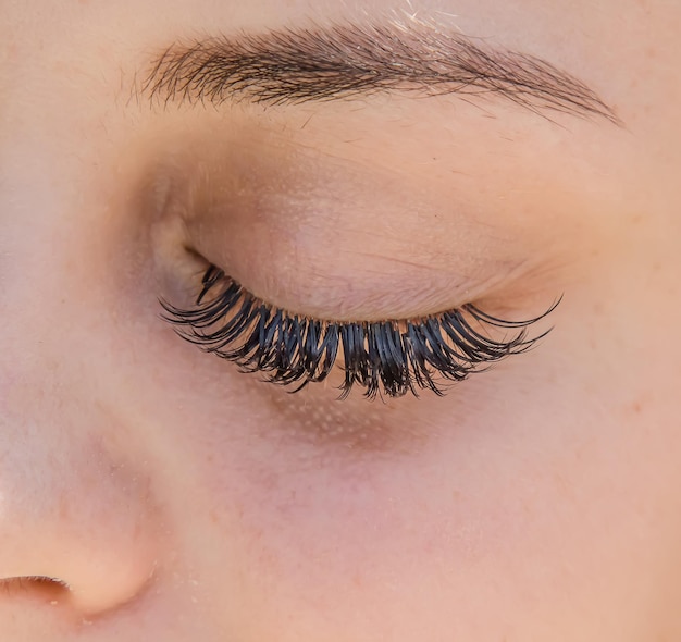 Photo traitement d'extension de cils cils yeux de femmes aux longs cils