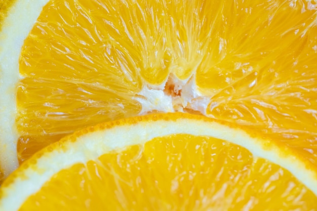 Tranche de fruits orange fendus dans une macro photo appétissante