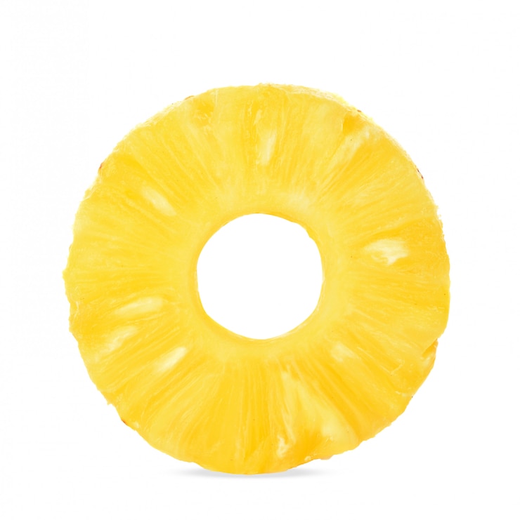 Photo tranches d'ananas frais, formes de beignets, ananas en conserve