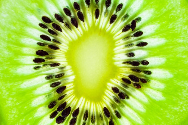 Tranches de fruits kiwi frais texture macro gros plan