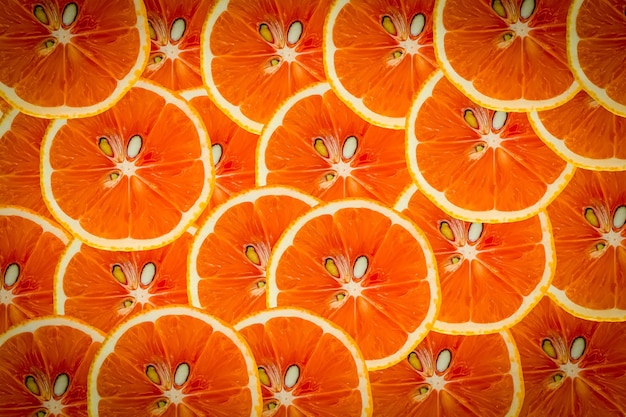 Tranches de fruits oranges. Vue de dessus du fond de texture de motif de tranches d'orange.