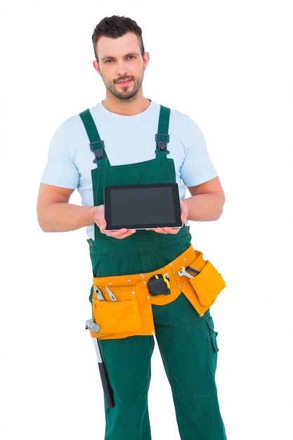 Travailleur de la construction tenant des tablet pc