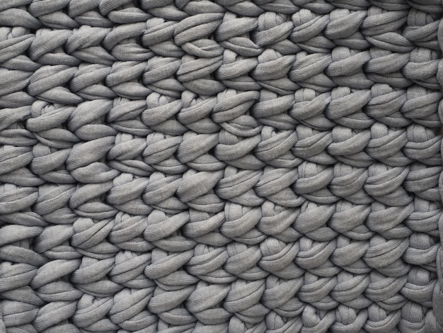 Tricot de fond. Fond gris