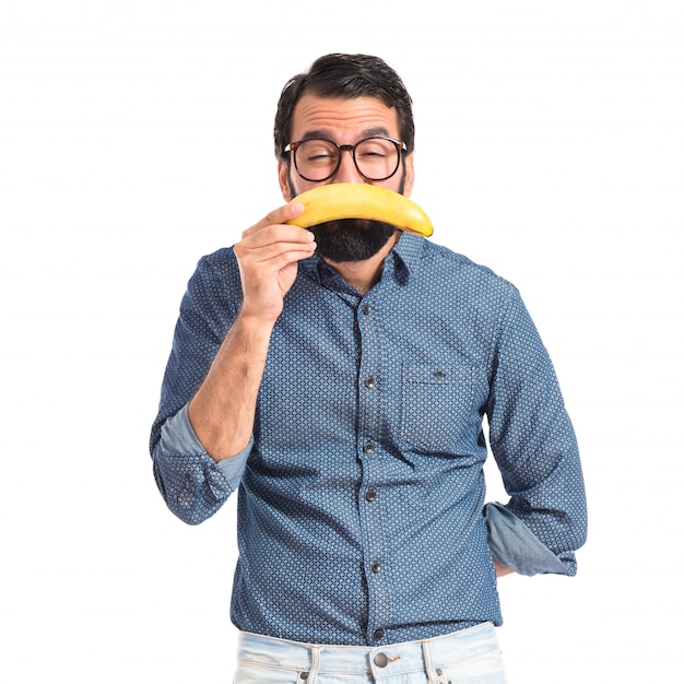 Triste jeune homme hipster avec banane