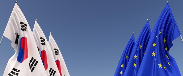 Trois drapeaux de l'Union européenne et de la Corée du Sud sur des mâts sur les côtés Drapeaux sur fond bleu Place pour le texte UE Europe Séoul Commonwealth Illustration 3D