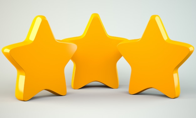 Photo trois étoiles jaunes sur fond gris