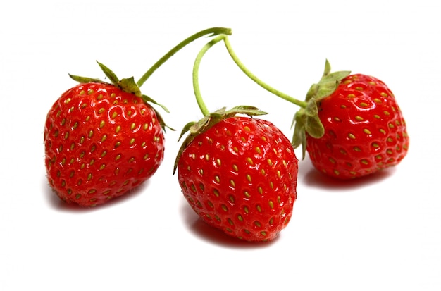 Trois fraises mûres